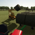 New Holland L555 and John Deere 675/B